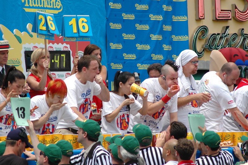 Eating with hands at hotdog eating competition