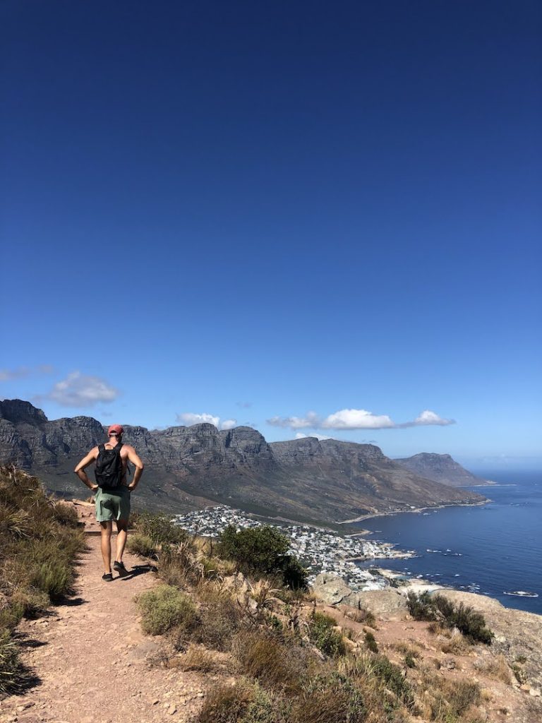 Chris hiking along flat trail in Cape Town.