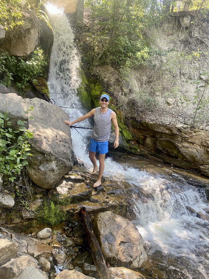 Thomas at a waterfall