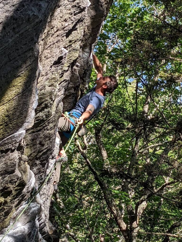 Russell Max Simon climbing