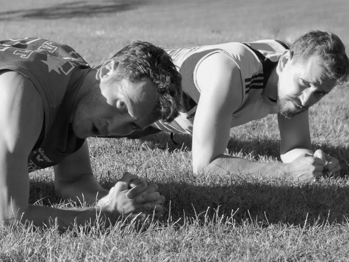Plug in your purpose cover image of Chris and Jorge working out